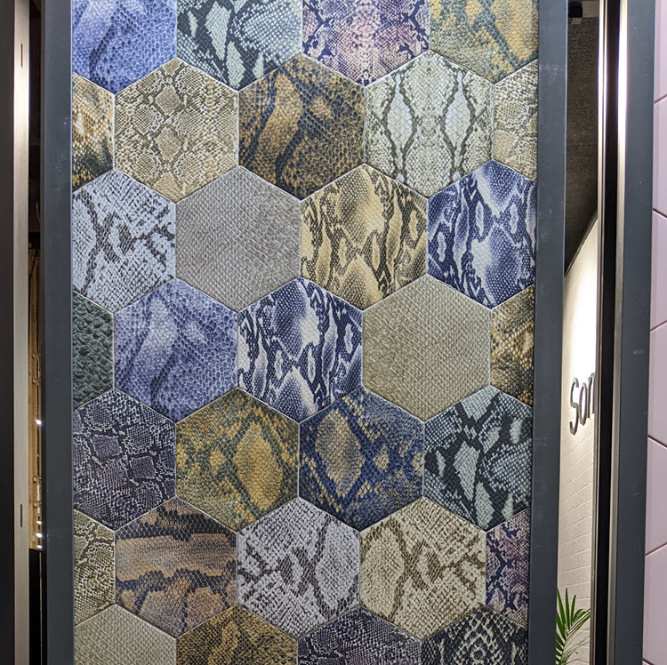 And check out this snakeskin-textured wall tile with shades of blue.   