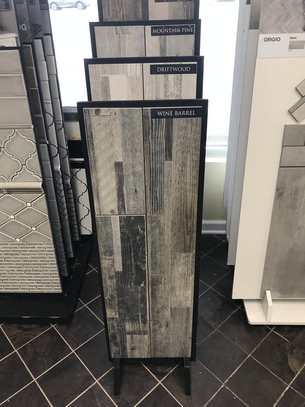 There are so many exciting products to discover at Floor Decor such as these barnwood plank tiles.