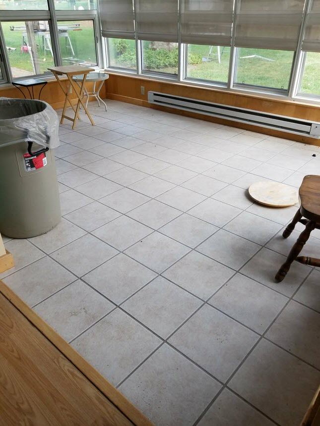 Imagine a floor other than tile in this space.