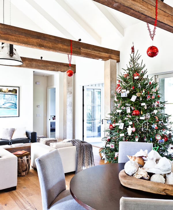 Consider adding touches such as bright red ornaments that hang from the exposed beams