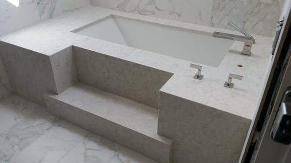 Marble-Look-Tile-TubHAVE YOU CONSIDERED MARBLE LOOK PORCELAIN TILE FOR YOUR HOME?