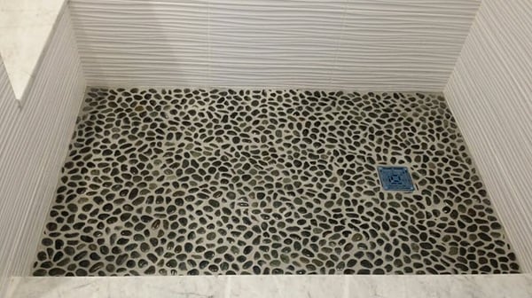 Pebble shower floor