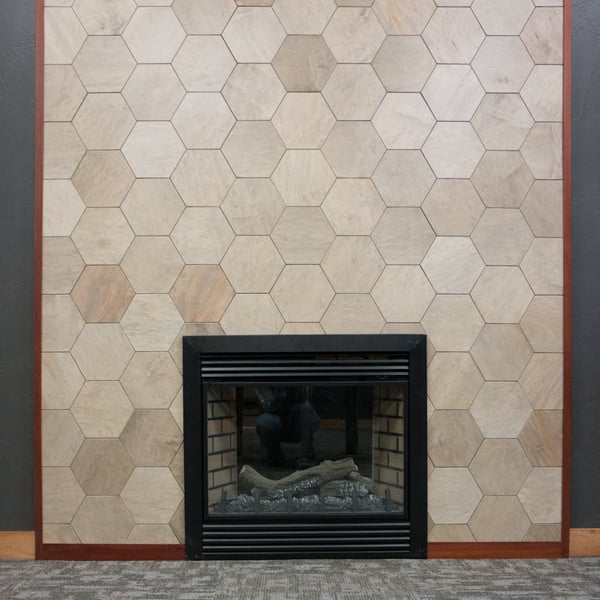Hexagon wall panel transforms a fire place