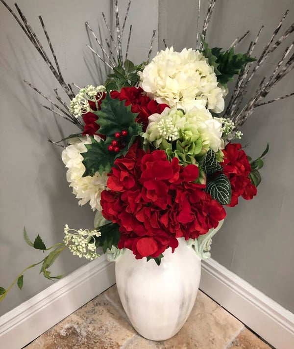 A gorgeous dramatic floral arrangement you can admire in the Middletown, CT showroom