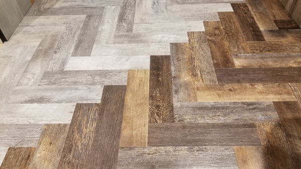 Why not be as versatile with vinyl planks as you might be with tile? 