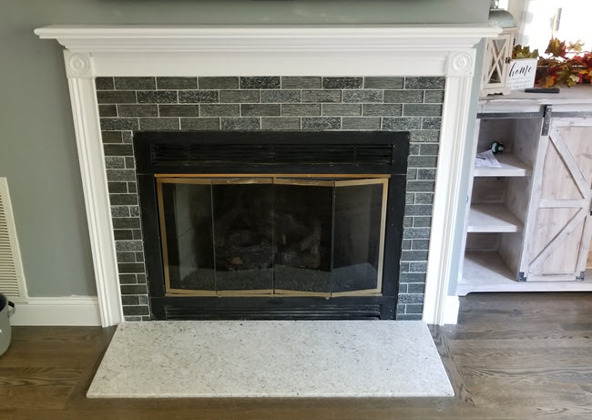 Here's the Final Result of this Fireplace Transformed with Tile!