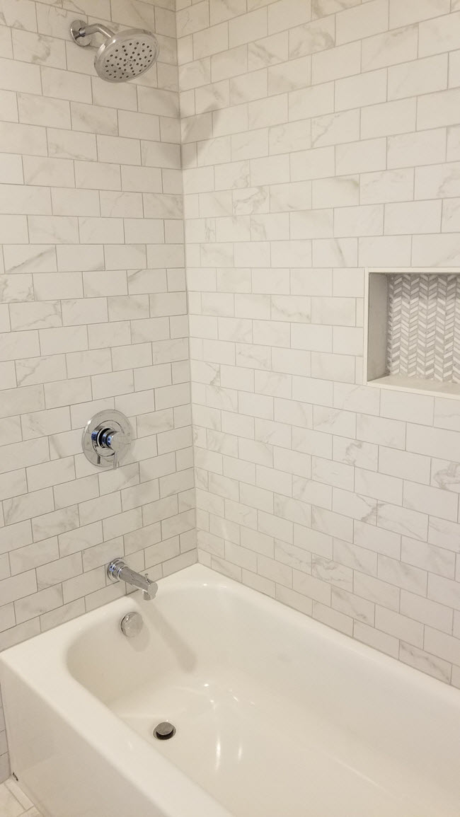 Marble-look porcelain tile bathroom remodel